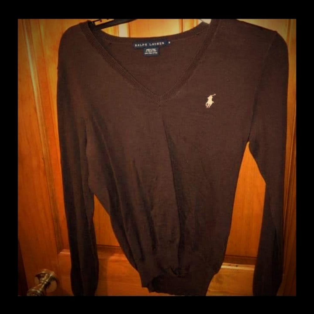 Polo sweater.